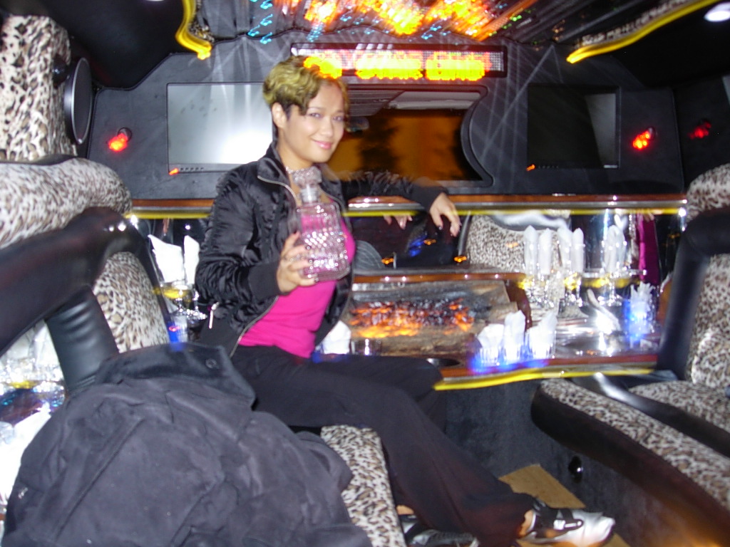 03 NeoKulture - arrival - Suzy, limo, and empty decanter