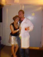04. Space Girls 2 - Robert in his lab coat mixing drinks back stage